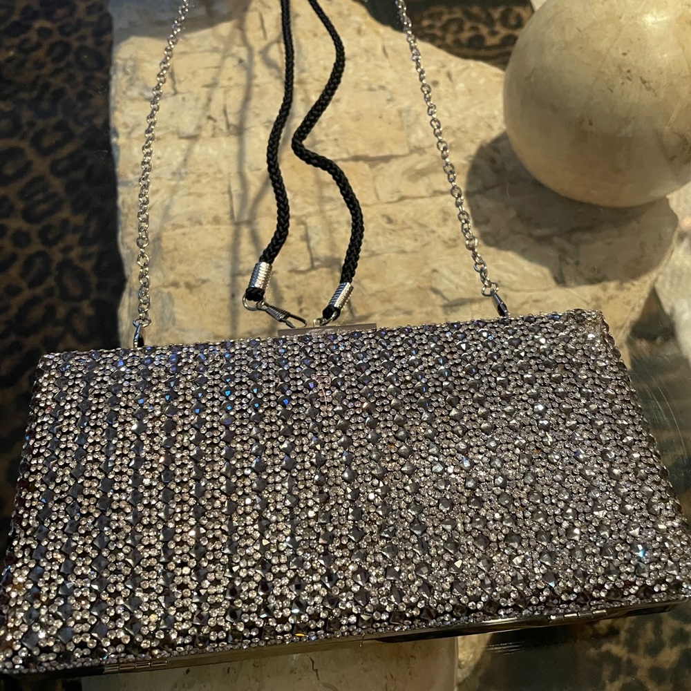 Nina glittery evening clutch with two straps.